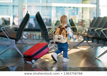 Stock photo: Happy Mother With Little Boy Travelling In Backpack