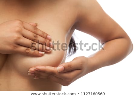 Сток-фото: Woman Performing Self Breast Examination