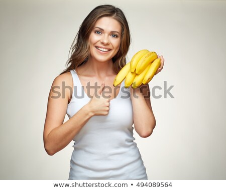 Stock foto: Orträt · der · Frau · mit · einer · Banane