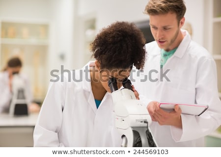 Stock photo: The Young Male Scientist Working In The Lab