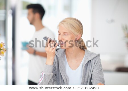 Stock fotó: Blond Woman Wearing Grey Hooded Top