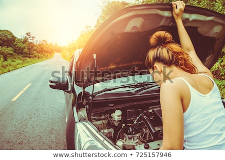 [[stock_photo]]: Young Woman At Broken Car