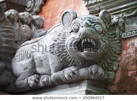 Animal Like A Dog On The Wall Of Temple Bali Indonesia Stockfoto © pzAxe