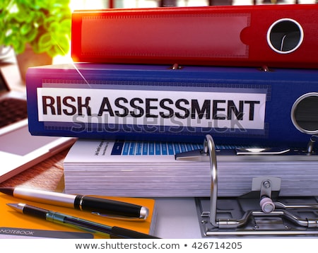 Foto stock: Risk Management On Yellow Ring Binder Blurred Toned Image