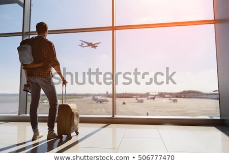 [[stock_photo]]: Male Tourists Standing With Suitcases And Luggage