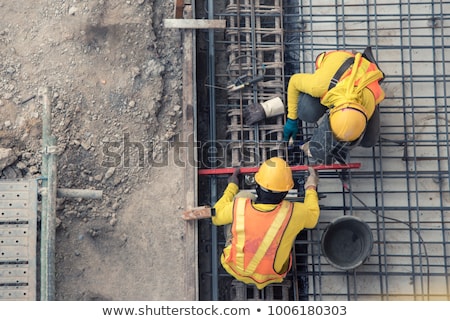 Stok fotoğraf: Construction Workers At Work