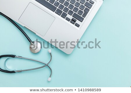 Foto stock: Laptop And Doctor With Stethoscope