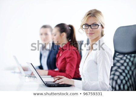 Businesswoman Talking With A Headset Against White Background [[stock_photo]] © dotshock