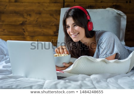 [[stock_photo]]: Beautiful Girl Watching Movie