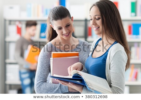 Сток-фото: Schoolmates Posing With Books