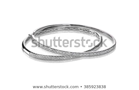 Foto d'archivio: Set Of Diamond Channel Set Bangle Bracelets Silver Or White Gold