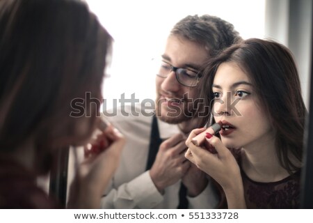 Stok fotoğraf: Fashionable Couple Going To Party