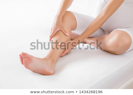 Stock foto: Young Adult Woman On Bed