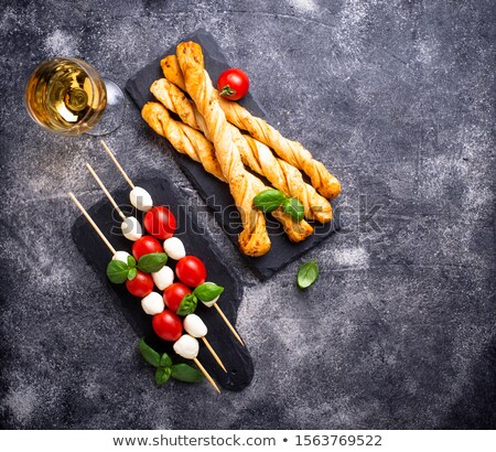 Stok fotoğraf: Caprese Skewers And Grissini Bread