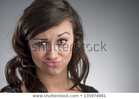 Foto d'archivio: Head And Shoulders Shot Of A Young Caucasian Woman Looking Strai