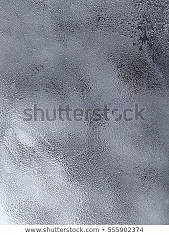 Stockfoto: Frozen Water Drops On Window Glass