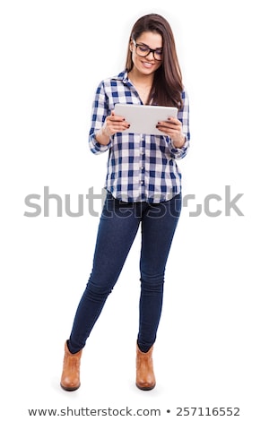 Foto stock: Cool Young Brunette Using Tablet