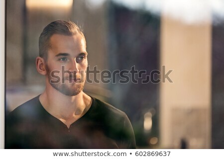 Stok fotoğraf: Male Model With Long Beard Looking Away From The Camera