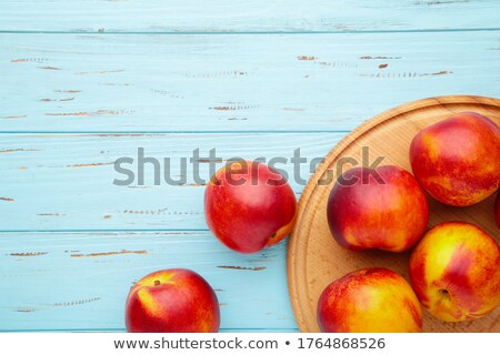 Foto stock: Fresh Nectarines On Blue Background