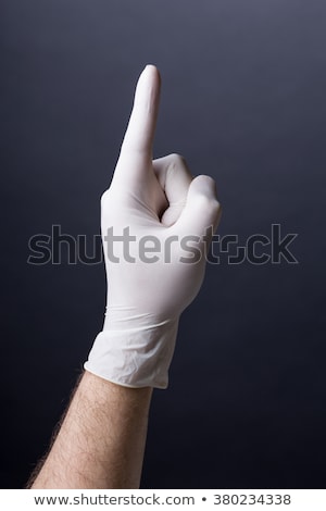 Zdjęcia stock: Male Hand In Latex Glove Pointing Up