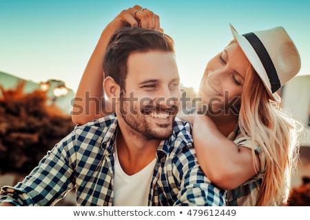 Foto stock: Happy Young Smiling Couple In Love Beautiful Couple Embraces In