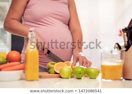 Stockfoto: Wangere · vrouw · die · vers · vruchtensap · maakt