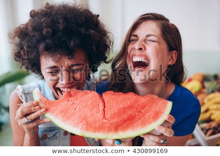 Foto d'archivio: Closeup Portrait Of Smiling Girl Holding Watermelon Slice In The