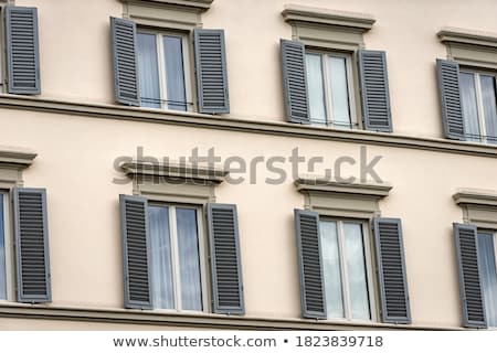 Stock foto: Row Of Shutters On Facade Of House