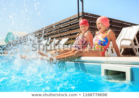 Stockfoto: Activities On The Pool Children Swimming And Playing In Water Happiness And Summertime