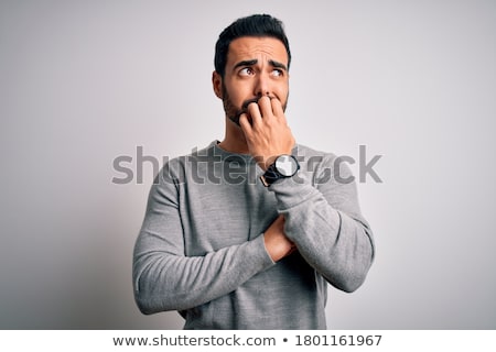 Сток-фото: Nervous Young Bearded Man Standing Isolated Over White Wall Background Make Stop Gesture