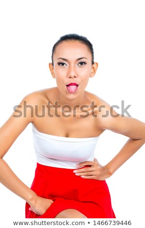 Stok fotoğraf: Young Asian Sticking Tonout Out Naughty