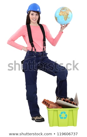 Stock fotó: Young Woman In A Hardhat With A Globe