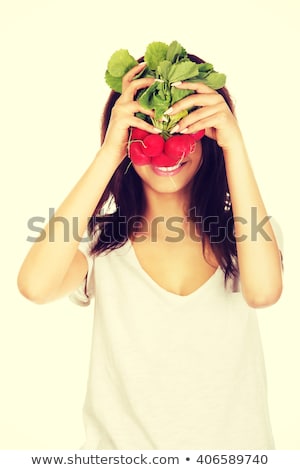 Stock fotó: Beautiful Brunette Eats Radish