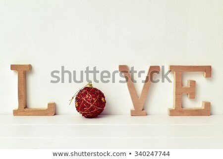 Letters And Christmas Bauble Forming The Word Love Foto stock © nito