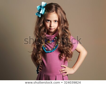 Foto stock: Elegant Blond Lady With The Colorful Chaplet