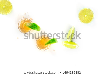 Stockfoto: Glasses Of Tequila With Lime Wedges