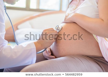 Foto stock: Gynecologist Examining Pregnant Woman