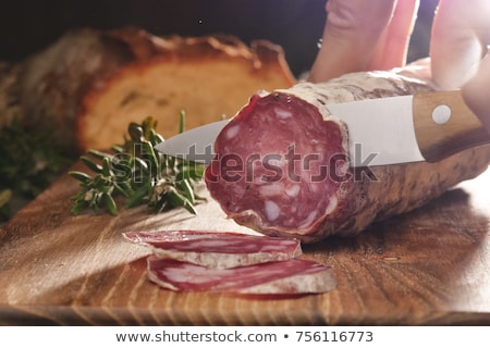 Foto stock: Thinly Sliced Salami Sausage