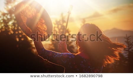 Stockfoto: Beautiful Woman Playing On Traditional Drums