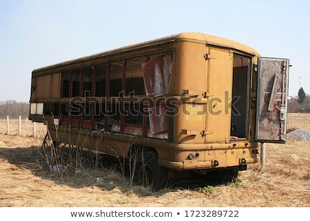 Stockfoto: An Old Abandoned Vintage Delivery Truck Van In A Field
