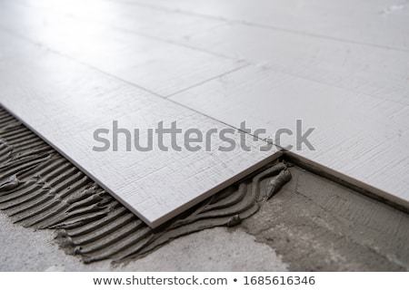 Tiler With Bucket [[stock_photo]] © dotshock