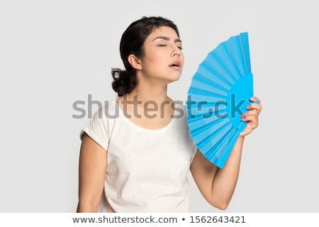 Foto stock: Beautiful Young Woman Or Teen Enjoying Cool Fan Breeze