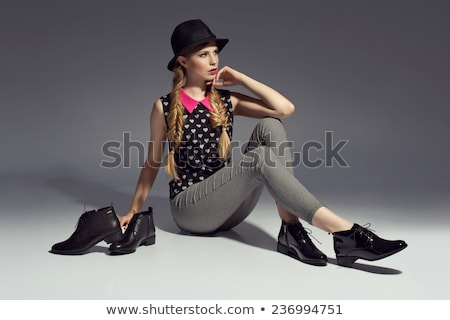 Zdjęcia stock: Pretty Young Blonde In Black Leggings