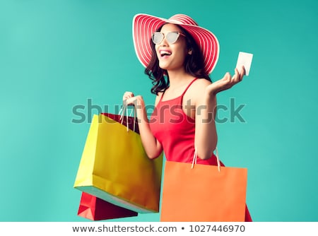 Stock fotó: Smiling Woman In Dress With Shopping Bags