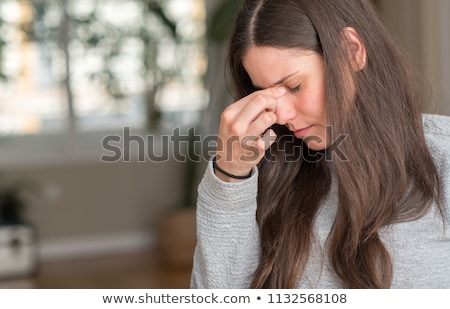 Foto stock: Pretty Brunette With A Headache