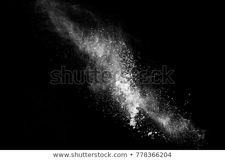 Foto stock: Freeze Motion Of Dust On Black