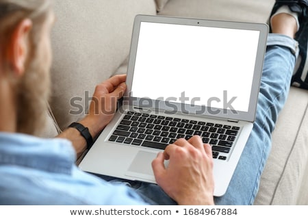 Zdjęcia stock: Man Using Laptop Computer In Office