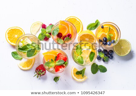 Foto d'archivio: Cold Summer Drink With Mint Strawberry And Lemon