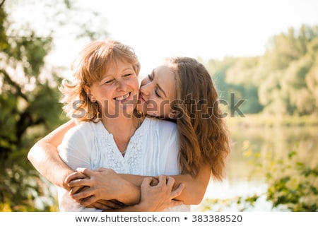 Stok fotoğraf: Daughter Hugging Mother