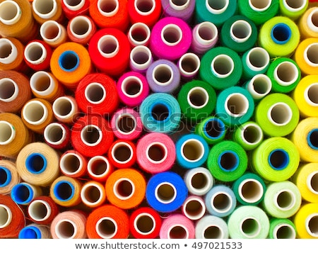 商業照片: Coils Of Colored Threads And Scissors